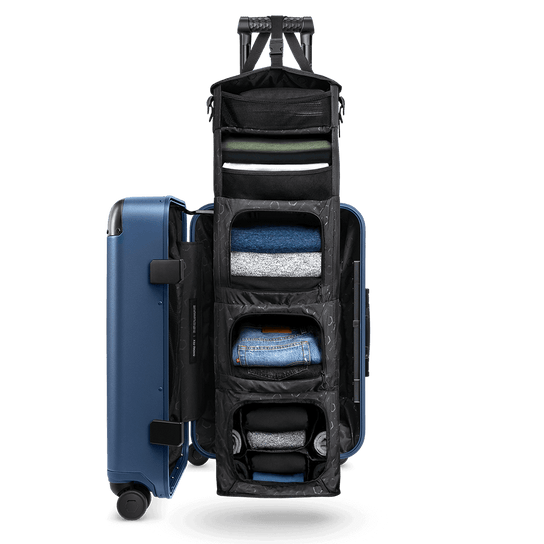Blue Carry-On Closet Original medium luggage open — spacious and organized travel suitcase interior